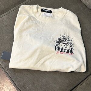 Outrank T shirt. Tags still attached never worn. Cream color